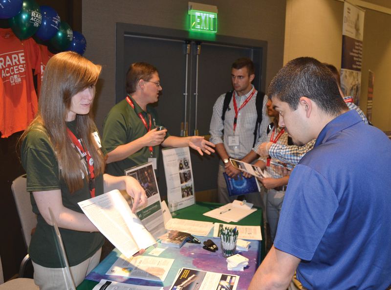 Graduate schools and institutions had their hands full with the hundreds of undergraduates requesting information and collecting SWAG. Photo courtesy of Matt Payne