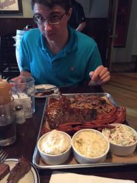 Hendrik admiring all of the food at Smoke and Barrel