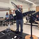 Jared Canright (New Mexico Tech) playing with the angular momentum wheel.